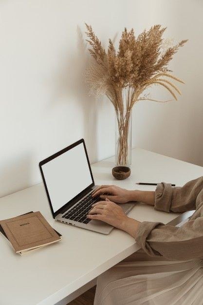 Working on a laptop at a calm desk